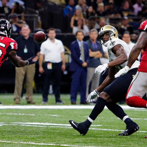 FILE - Atlanta Falcons outside linebacker Deion Jones (45) intercepts a pass from New Orleans Saints quarterback Drew Brees, not pictured, and returns it for a touchdown, in the second half of an NFL football game in New Orleans, on Sept. 26, 2016. (AP Photo/Butch Dill, File)