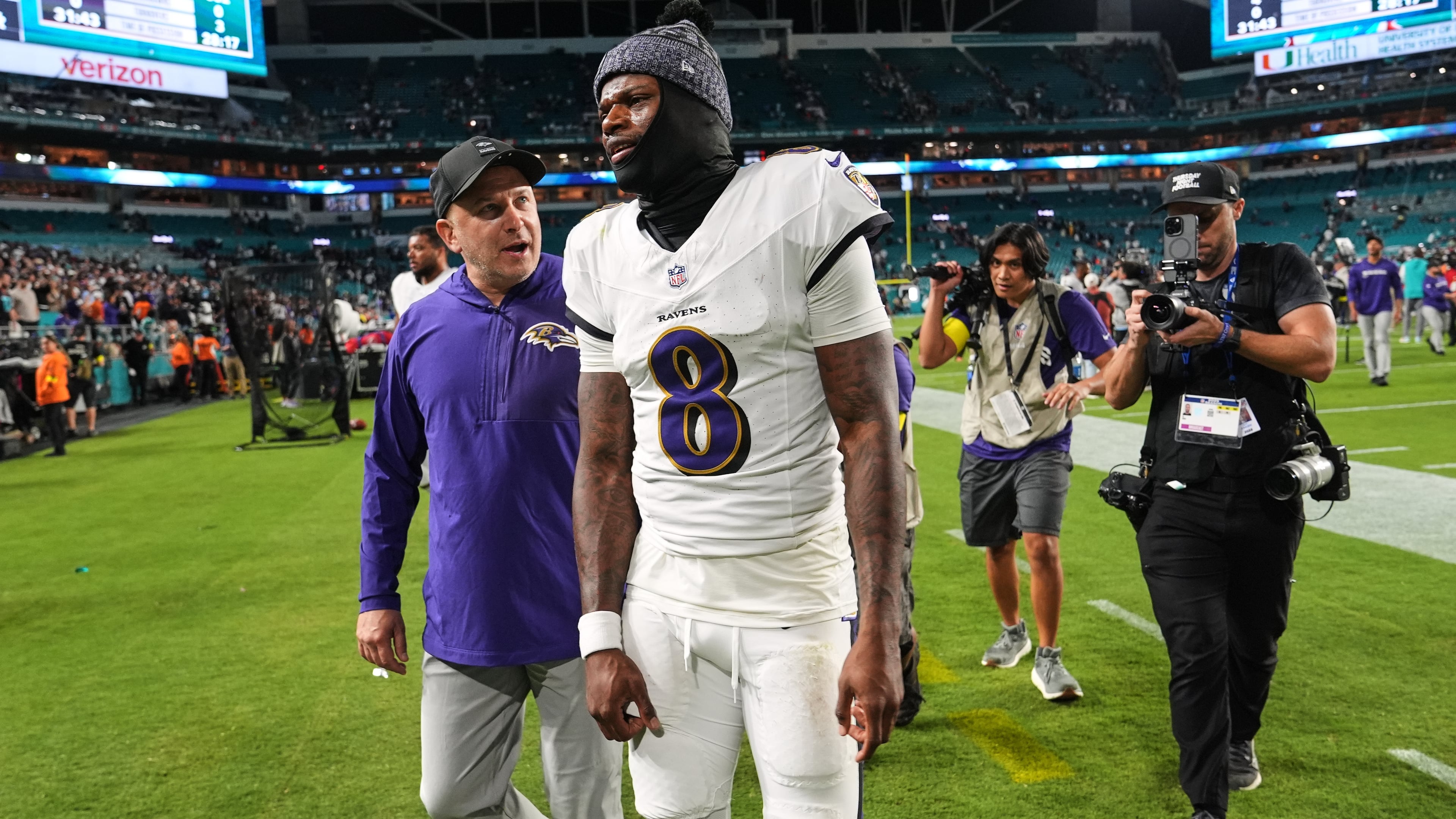 Baltimore Ravens quarterback Lamar Jackson (8) leaves the field after a win over the Miami Dolphins in an NFL football game, Thursday, Oct. 30, 2025, in Miami Gardens, Fla. (AP Photo/Lynne Sladky)