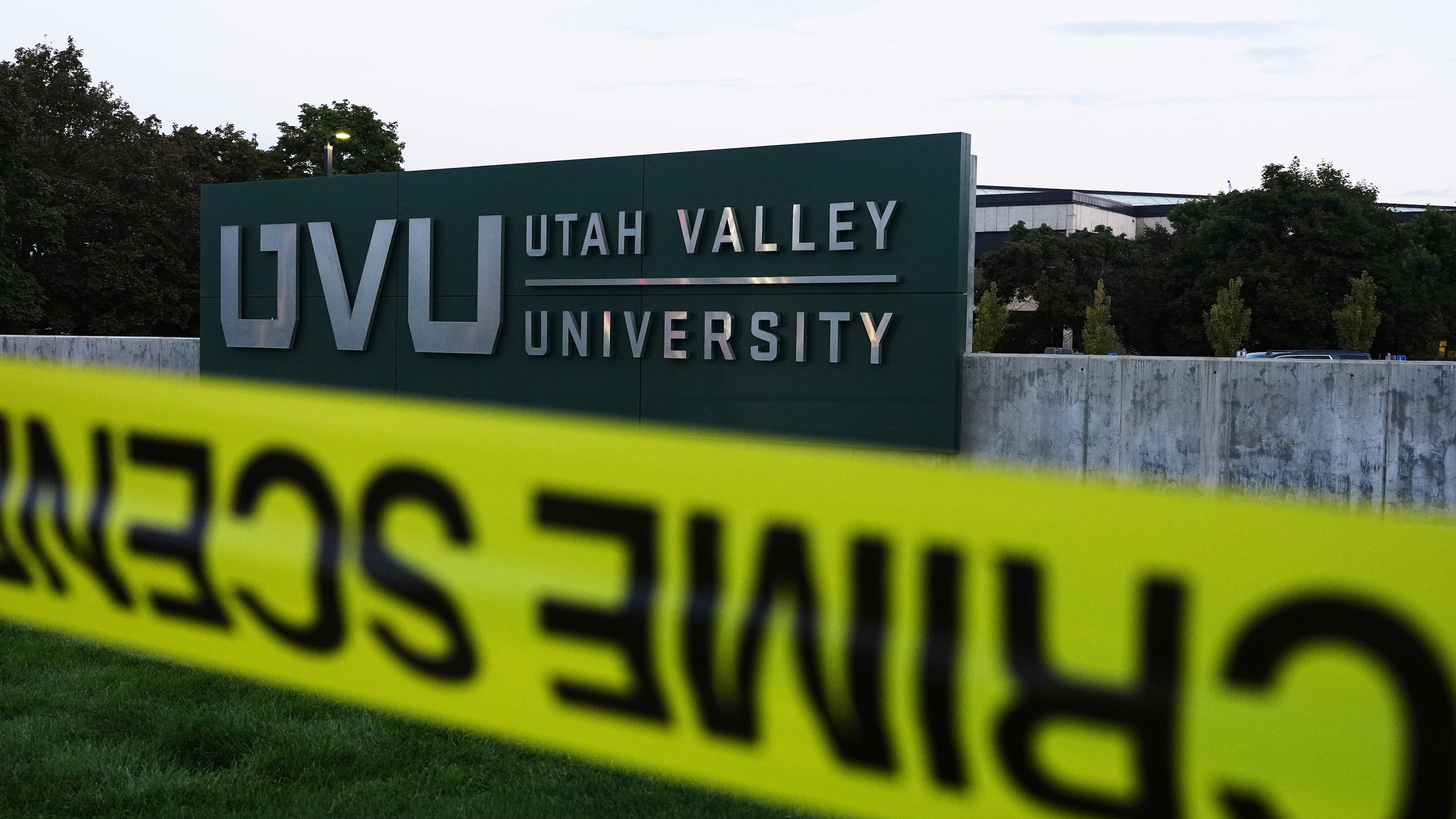 FILE - Crime scene tape surrounds Utah Valley University after Turning Point USA CEO and co-founder Charlie Kirk was shot and killed Sept. 13, 2025, in Orem, Utah. (AP Photo/Lindsey Wasson, File)