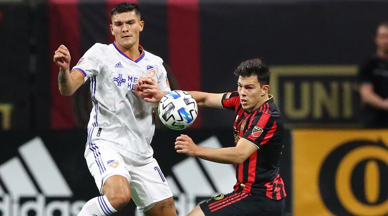 Atlanta United defender Fernando Meza (right) works against FC Cincinnati forward Brandon Vazquez in a MLS soccer match on Saturday, March 8, 2020, in Atlanta.   Curtis Compton ccompton@ajc.com