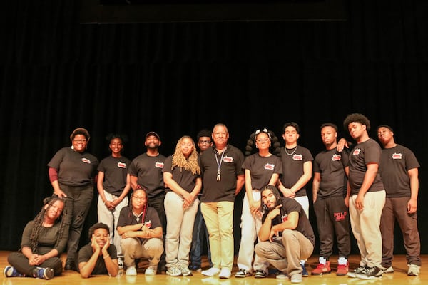 This image released by Carnegie Mellon University shows Gary Edwin Robinson, recipient of the 2025 Excellence in Theatre Education Award, center, with his students at the Boys and Girls High School in the Brooklyn borough of New York on May 7, 2025. (Pam Wigley/Carnegie Mellon University via AP)