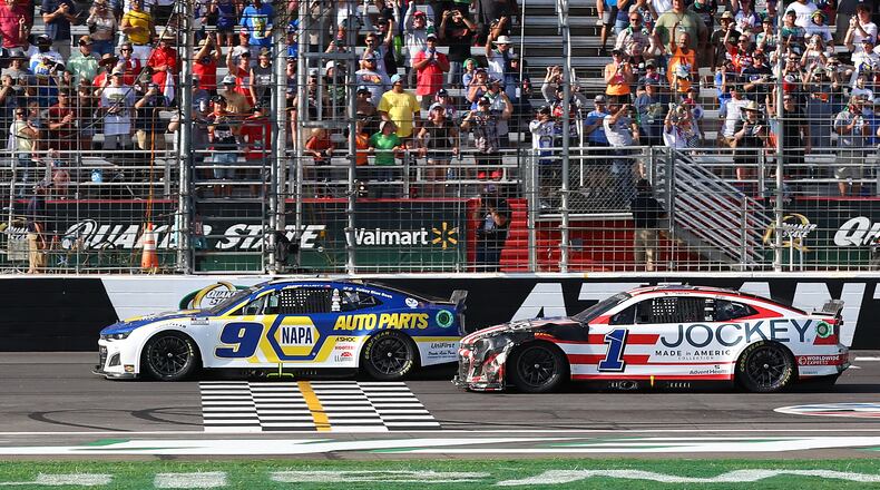 Chase Elliott, of Dawsonville, wins the Quaker State 400 on July 10 at Atlanta Motor Speedway. (Curtis Compton / Curtis.Compton@ajc.com)