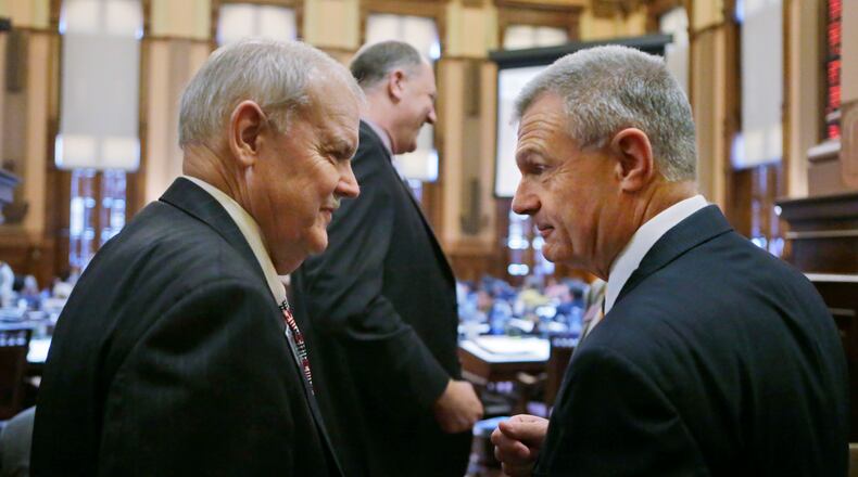 Rep. Randy Nix (right), R - LaGrange, who carried the bill in the House, confers with Sen. Lindsey Tippins, R-Marietta, who sponsored the bill, after it's passage. Senate Bill 364 passed the House Tuesday. It is the biggest education-related bill of this legislative session. It cuts back on testing and the use of tests in teacher evaluations, affecting more than 100,000 teachers and 1.7 million Georgia students. BOB ANDRES / BANDRES@AJC.COM