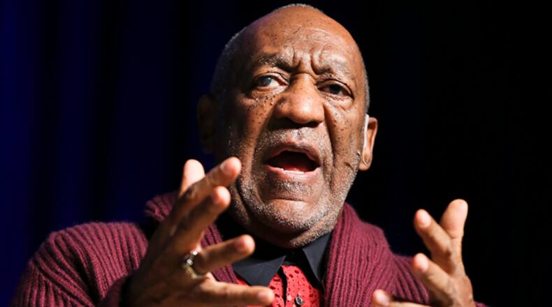 Comedian Bill Cosby performs at the Stand Up for Heroes event at Madison Square Garden, Wednesday, Nov. 6, 2013, in New York. (John Minchillo/Invision/AP)
