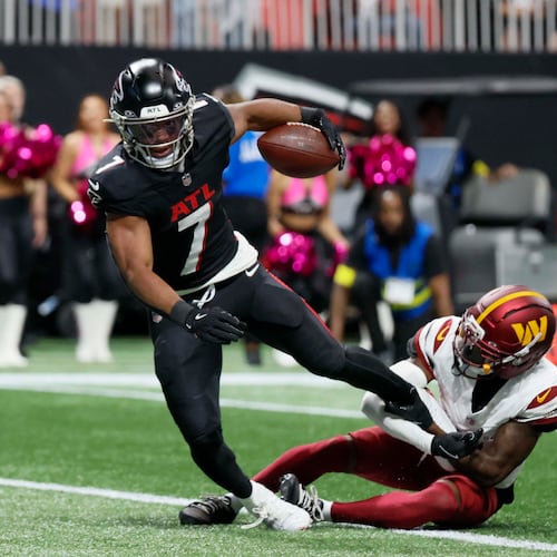 Atlanta Falcons running back Bijan Robinson crosses the goal line during the first half of Sept. 28's win over the Washington Commanders. (Miguel Martinez/AJC)