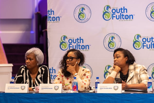 South Fulton City Council members Catherine Rowell, Carmalitha Gumbs and Helen Willis listen during a feedback session about the millage rate cap at The Enon Church in South Fulton on Wednesday, Sept. 3, 2025. The city's plan to remove or raise the millage rate cap would help finance the construction of two public safety buildings. (Arvin Temkar/AJC)