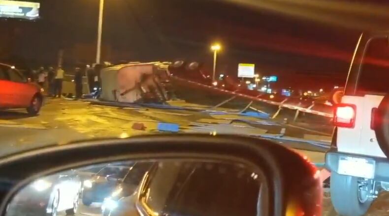 This is a screenshot of video a witness provided to Channel 2 Action News of the overturned tractor-trailer.