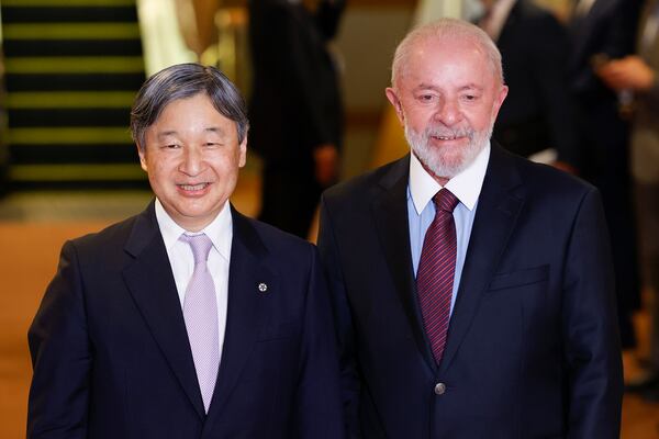 Japanese Emperor Naruhito, left, and Brazilian President Luiz Inacio Lula da Silva pose for a photo at the Imperial Hotel in Tokyo, Thursday, March 27, 2025. (Rodrigo Reyes Marin/Pool Photo via AP)