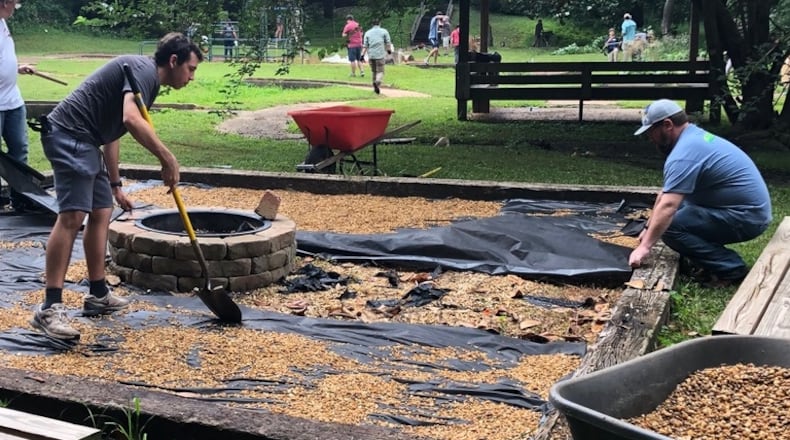 xxx showed up at Solomon's Temple for an outdoor day of service. The firepit area was among the improved amenities.