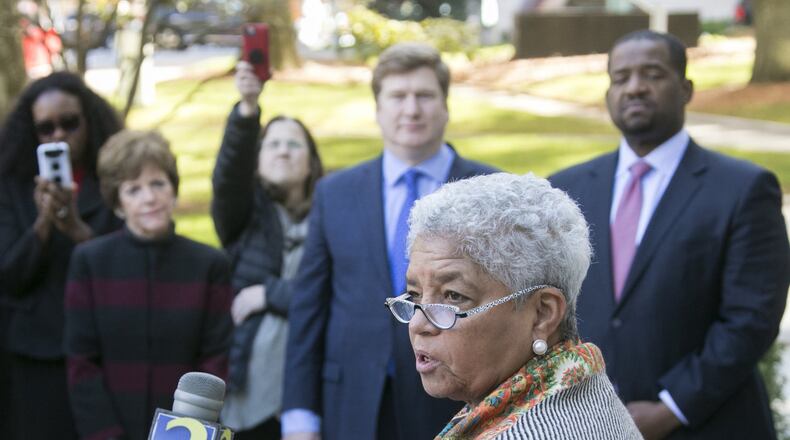 Shirley Franklin endorses Mary Norwood (back, left) as she watches with Peter Aman and Ceasar Mitchell. Former Atlanta Mayor Shirley Franklin endorsed Mary Norwood’s campaign at a press conference in front of City Hall along with former Atlanta chief operating officer Peter Aman and City Council President Ceasar Mitchell. BOB ANDRES /BANDRES@AJC.COM