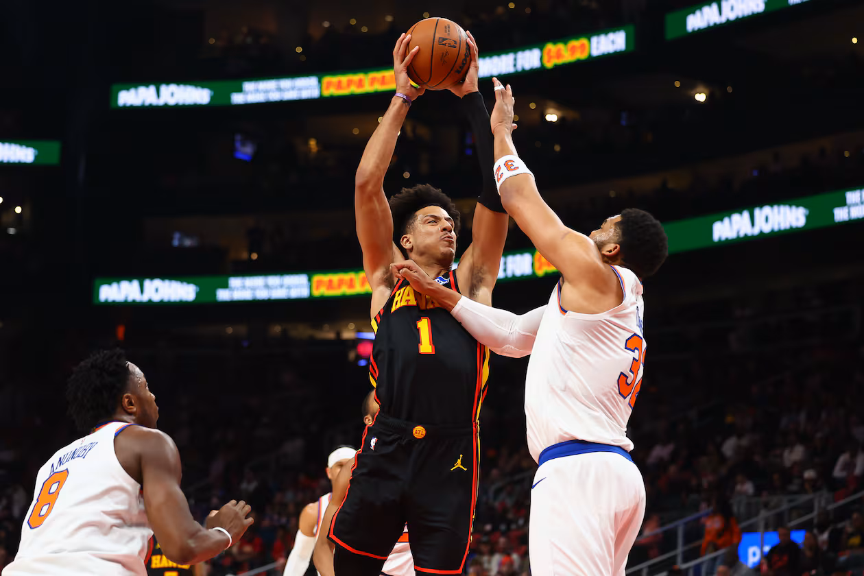Atlanta Hawks forward Jalen Johnson looks to shoot against New York Knicks center Karl-Anthony Towns, right, during the first half of an NBA basketball game, Monday, April 6, 2026, in Atlanta. (Colin Hubbard/AP)