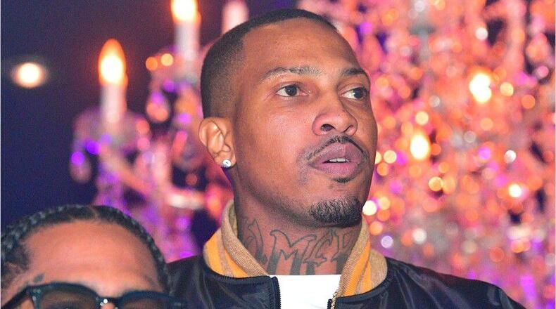 Slain rapper Trouble's life was celebrated Thursday during a vigil in Edgewood.