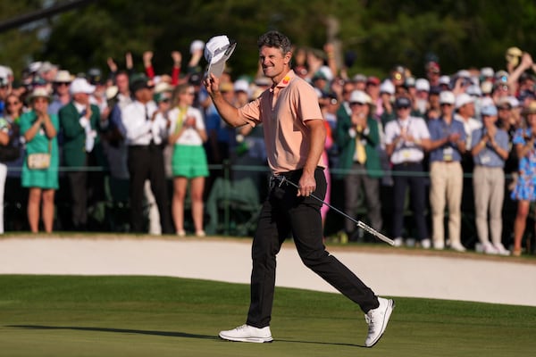 Justin Rose celebrates after a birdie on the 18th hole during the final round at the Masters golf tournament, Sunday, April 13, 2025, in Augusta, Ga. (AP Photo/Matt Slocum)