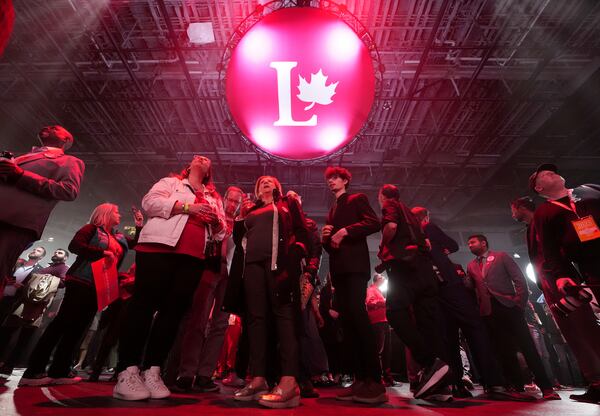 Liberal Party supporters cheer on results at the party election night headquarters in Ottawa, Ontario, Monday, April 28, 2025. (Nathan Denette/The Canadian Press via AP)