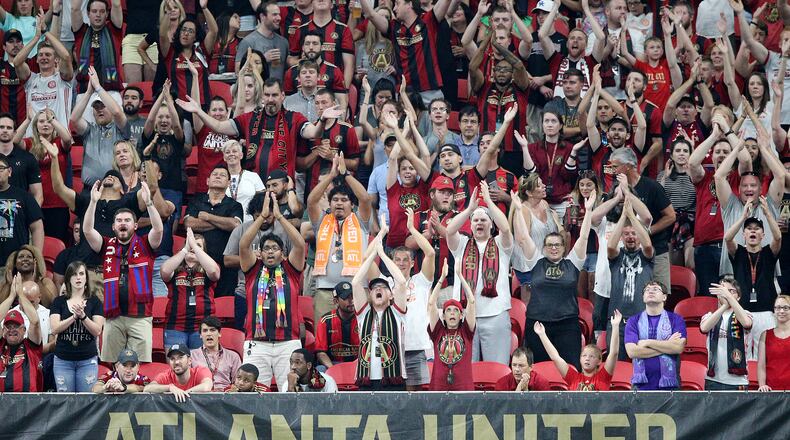 Atlanta United fans cheer for their team earlier this season.