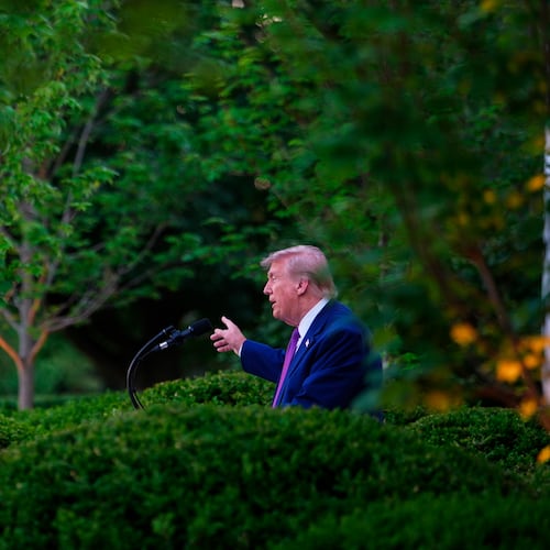 President Donald Trump speaks at a dinner for members of his administration and law enforcement organization leaders, during National Police Week, in the White House Rose Garden, Monday, May 11, 2026, in Washington. (AP Photo/Julia Demaree Nikhinson)