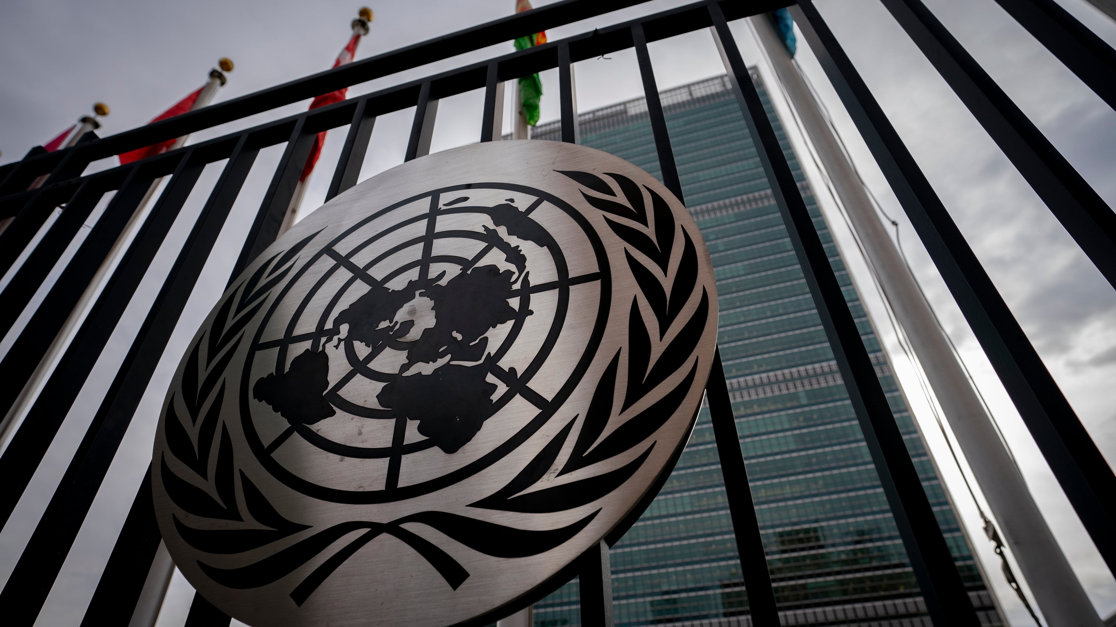 FILE - The symbol of the United Nations is displayed on the main gate outside UN headquarters, Feb. 24, 2022, in New York. (AP Photo/John Minchillo, file)