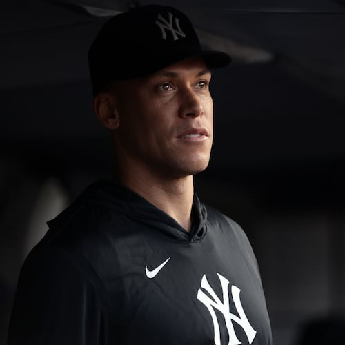 New York Yankees' Aaron Judge looks on from the dugout during the third inning of a baseball game against the Los Angeles Dodgers, Friday, July 17, 2026, in New York. (AP Photo/Adam Hunger)