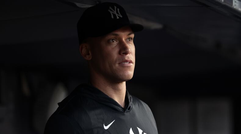 New York Yankees' Aaron Judge looks on from the dugout during the third inning of a baseball game against the Los Angeles Dodgers, Friday, July 17, 2026, in New York. (AP Photo/Adam Hunger)