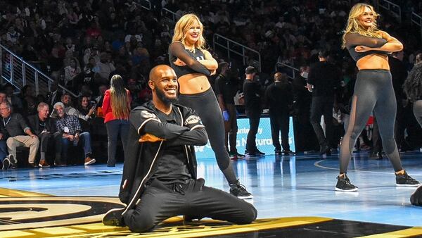 The ATL Hawks Dancers and Calvin Brown at work. (Courtesy of Atlanta Hawks)
