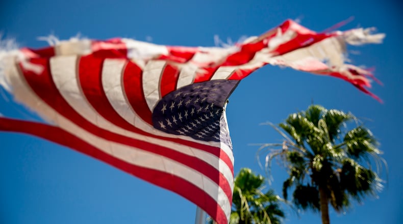 An American flag waves down the street from the El Centro Regional Medical Center on May 20, 2020, in El Centro, California. (Sam Hodgson/The San Diego Union-Tribune/TNS)