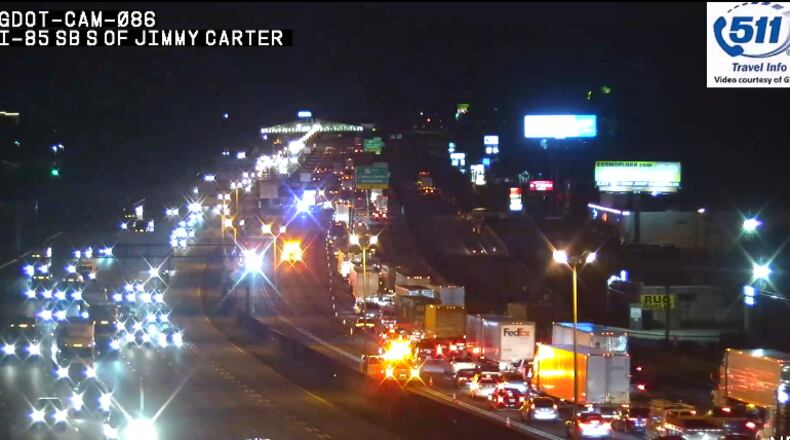 Two tractor-trailers were also involved in the crash just south of the Jimmy Carter Boulevard exit, Gwinnett County police told Channel 2 Action News.