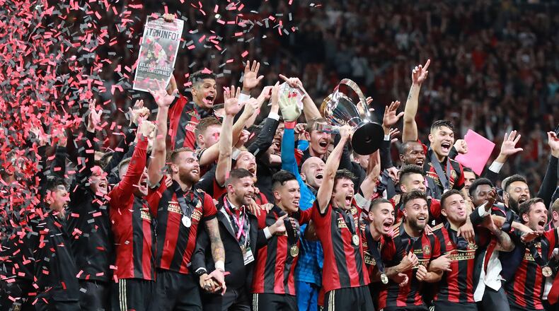 Atlanta United celebrates winning the MLS Cup over the Portland Timbers on  Dec. 8 in Mercedes-Benz Stadium.