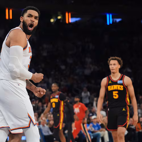 New York Knicks' Karl-Anthony Towns celebrates during the second half in Game 1 of a first-round NBA playoffs basketball series against the Atlanta Hawks, Saturday, April 18, 2026, in New York. (AP Photo/Frank Franklin II)