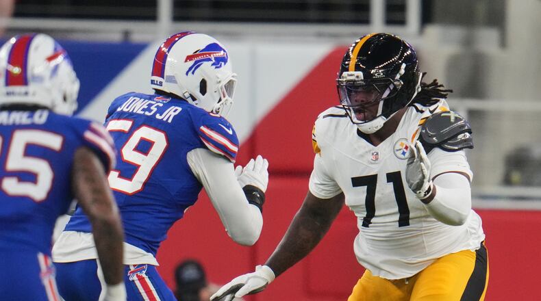 Pittsburgh Steelers offensive tackle Max Iheanachor (71) defends against the rush by Buffalo Bills' Andre Jones Jr. (59) in the first half of a preseason NFL football game in Orchard Park, NY., Thursday, Aug. 27, 2026. (AP Photo/Gene J. Puskar)