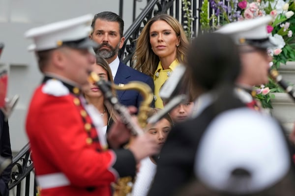 Donald Trump Jr., and his girlfriend Bettina Anderson arrive for the White House Easter Egg Roll on the South Lawn of the White House, Monday, April 21, 2025, in Washington. (AP Photo/Alex Brandon)
