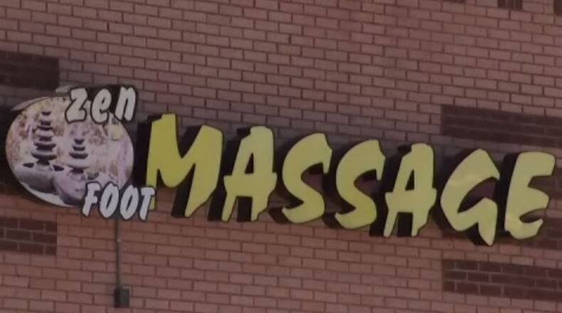 Roswell officals will look to actions taken by neighboring cities, such as Johns Creek, to stop illegal activity at massage parlors. In 2013, police made arrests at Zen foot massage. (Credit: Channel 2 Action News)