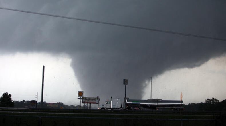 A tornado moves through Tuscaloosa, Ala. Wednesday, April 27, 2011, when a wave of severe storms laced with tornadoes strafed the South.