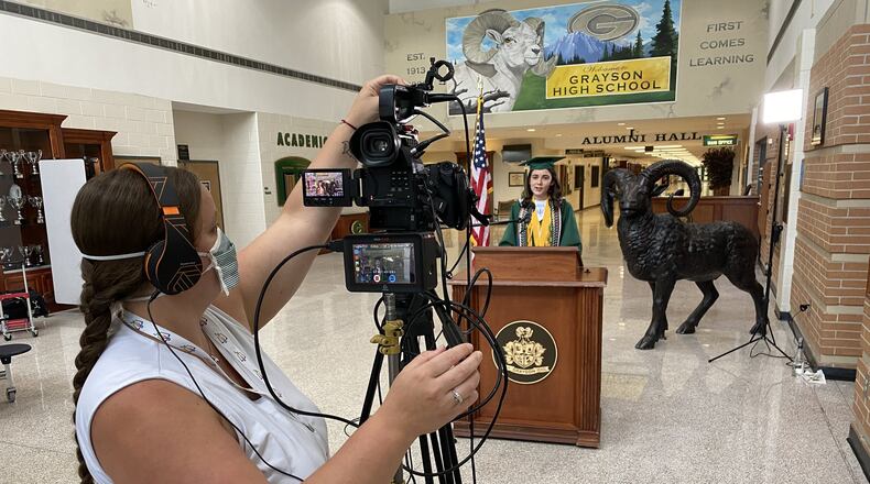 Heather O’Shaughnessy with GCPS Broadcast and Distant Learning records Grayson High School valedictorian Claire Mistretta giving her speech for the virtual graduation ceremony set to air Saturday morning. COURTESY OF GWINNETT COUNTY PUBLIC SCHOOLS