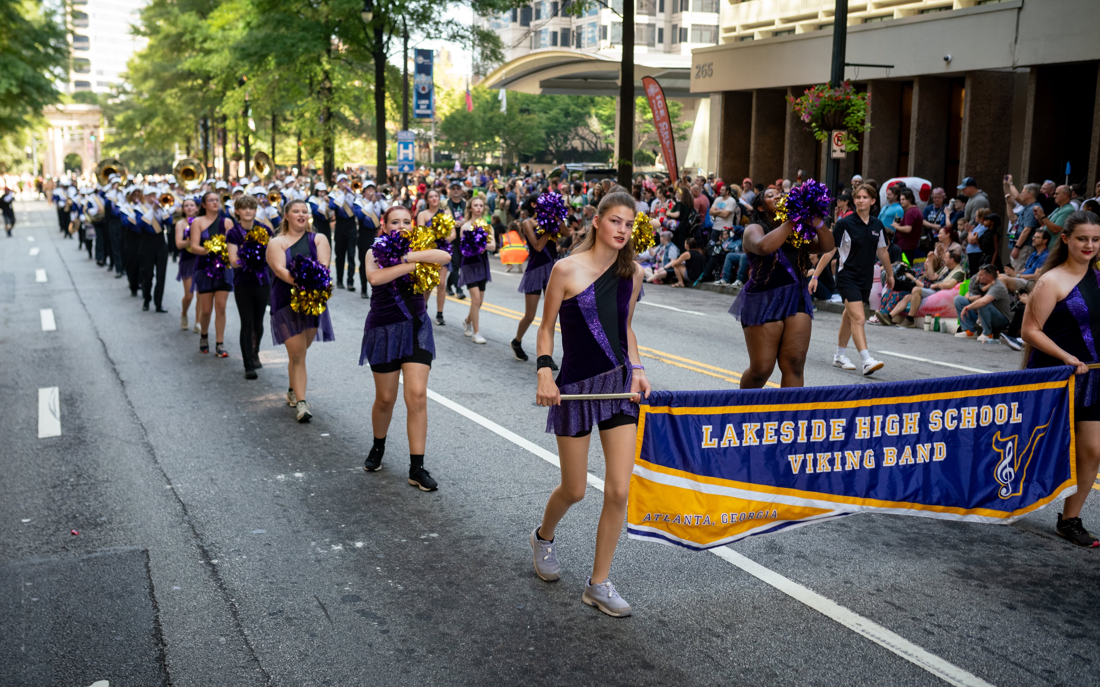 Thousands lined up along Peachtree Street on Saturday morning, August 31, 2024, for the annual Dragon Con parade in Atlanta. (Ben Hendren for The Atlanta Journal-Constitution)