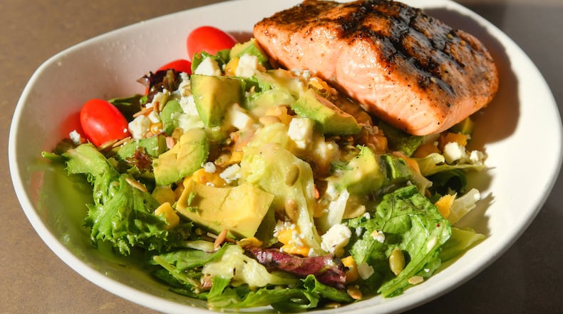 Bonefish Grill's Citrus Herb Vinaigrette, shown with the restaurant's Florida Cobb Salad with salmon. (Chris Hunt for The Atlanta Journal-Constitution)