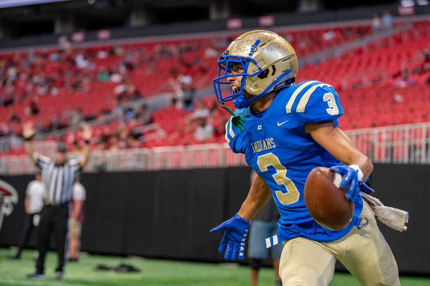 Tyler Cruver, a senior at McEachern, scores a touchdown. (Jamie Spaar for the Atlanta Journal Constitution)
