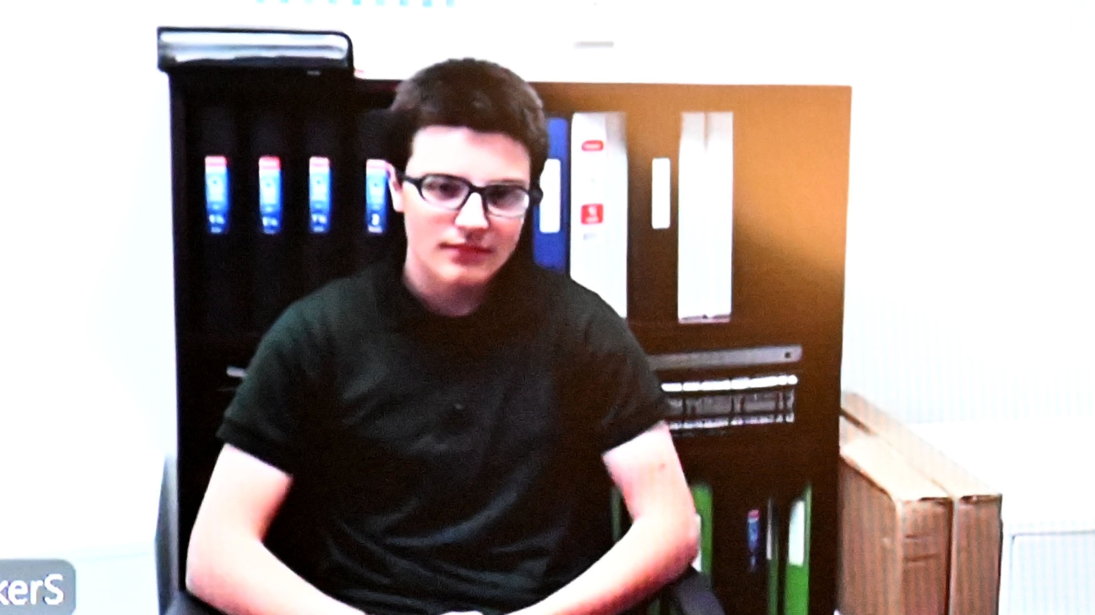 Colt Gray appears on screen via a video link during a virtual court hearing on Tuesday, May 6, 2025, in Winder. Gray, 14, was indicted on 55 charges in the Sept. 4 shooting, including four counts of murder. (Hyosub Shin/AJC 2025)