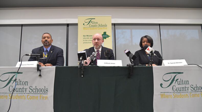 Fulton County Schools officials, from left, Shannon Flounnory, executive director of safety and security; Cliff Jones, chief academic officer; and Gyimah Whitaker, area superintendent, speak to reporters during a Feb. 21, 2019  news conference about drug-laced edibles brought to Sandtown Middle School last week.