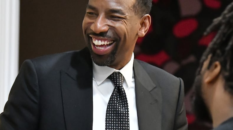 December 1, 2021 Atlanta - Mayor-elect Andre Dickens greets Jenifer Keenan, reacts as he talks to campaign staff at his campaign headquarters on Wednesday, December 1, 2021. Andre Dickens, the Atlanta native who first beat an incumbent eight years ago for a spot on the City Council, defeated Felicia Moore in Tuesday's runoff election to become Atlanta's 61st mayor. (Hyosub Shin / Hyosub.Shin@ajc.com)