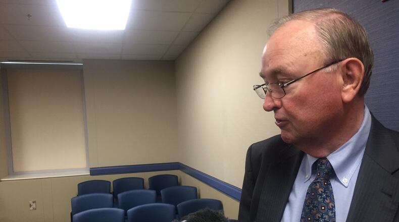 University System of Georgia Chancellor Hank Huckaby talks to reporters after Tuesday’s state Board of Regents Executive and Compensation Committee meeting. ERIC STIRGUS