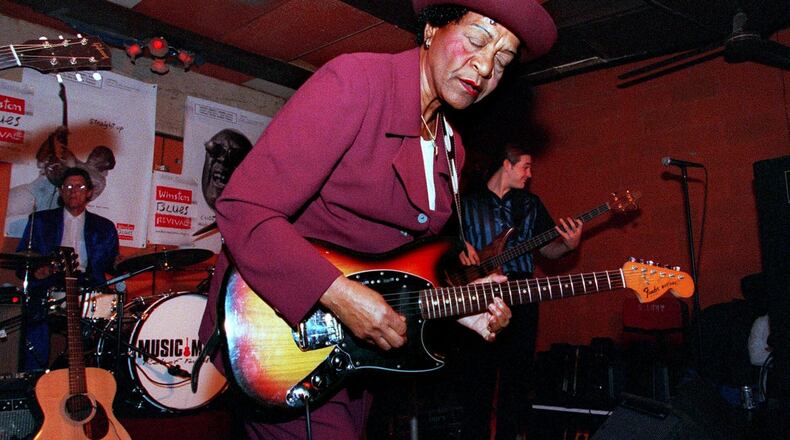 Beverly ‘Guitar’ Watkins performed in Chicago in 1998, in Chicago. Backing her up is drummer Artie Dean, left, and bass guitarist, right, is Jon Schwenke. (AP Photo/Stephen J. Carrera)