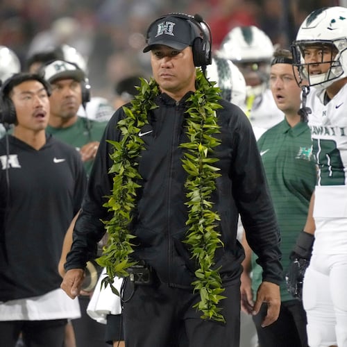 FILE - Hawaii head coach Timmy Chang in the first half during an NCAA football game against Arizona on Saturday, Aug. 30, 2025, in Tucson, Ariz. (AP Photo/Rick Scuteri, file)