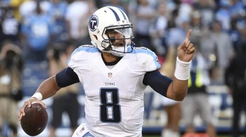 Tennessee Titans quarterback Marcus Mariota throws a pass during the second half of an NFL football game against the San Diego Chargers Sunday, Nov. 6, 2016, in San Diego. (AP Photo/Denis Poroy).jpg
