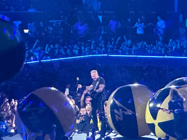 James Hetfield incongruously surrounded by beach balls during "Seek and Destroy" during the Metallica concert on June 3, 2025, at Mercedes-Benz Stadium. (Rodney Ho/AJC)