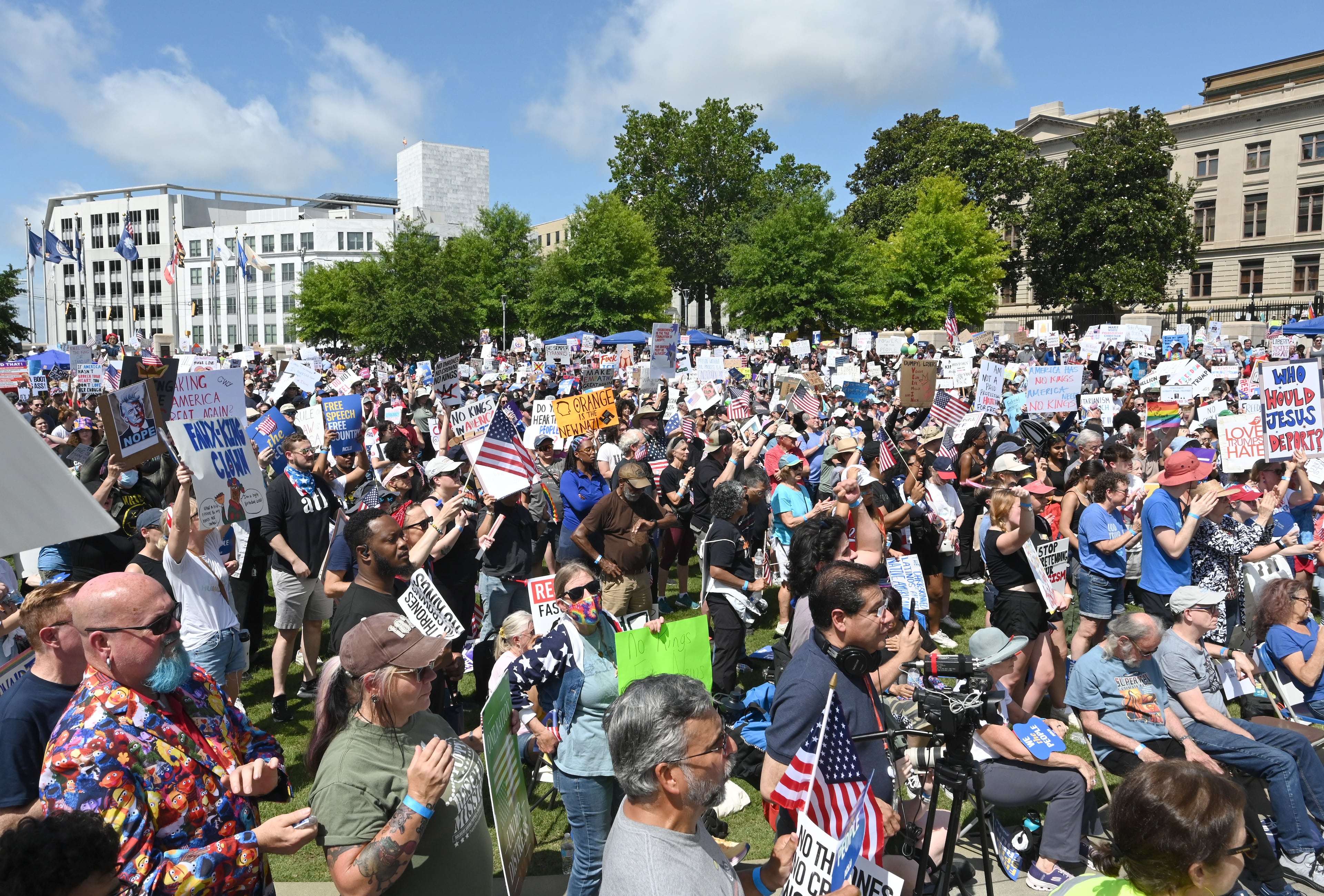 Demonstrators gather at Liberty Plaza, near the Georgia Capitol, for a "No Kings" protest to oppose Trump’s immigration policies, Saturday, June 14, 2025, in Atlanta. (Hyosub Shin / AJC)