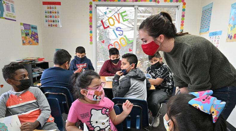 To address pandemic learning loss, Gwinnett County Public Schools brought in more than 30 tutoring providers to work with students who needed additional help with school coming back from virtual learning. Here, Carrie Schneider, program director, helps students during an after-school tutoring program at Corners Outreach in Norcross on Wednesday, Feb. 16, 2022. (Hyosub Shin / Hyosub.Shin@ajc.com)