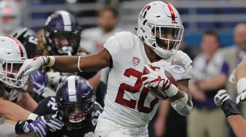 Stanford running back Bryce Love (20) carries on a 15-yard touchdown run in the first quarter against Texas Christian in the Valero Alamo Bowl at the Alamodome in San Antonio, Texas, on Thursday, Dec. 28, 2017. (Rodger Mallison/Fort Worth Star-Telegram/TNS)