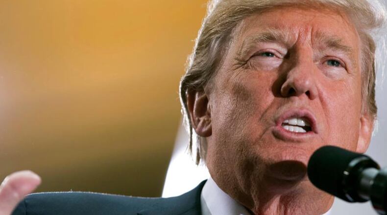 President Donald Trump speaks about on his decision to shrink the size of Bears Ears and Grand Staircase Escalante national monuments, Monday, Dec. 4, 2017, in Salt Lake City. (AP Photo/Evan Vucci)
