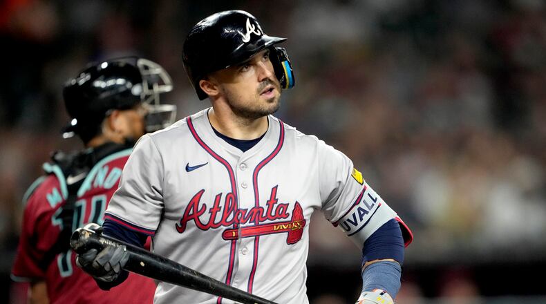 Atlanta Braves' Adam Duvall looks away after striking out against the Arizona Diamondbacks during the fifth inning of a baseball game, Thursday, July 11, 2024, in Phoenix. (AP Photo/Matt York)