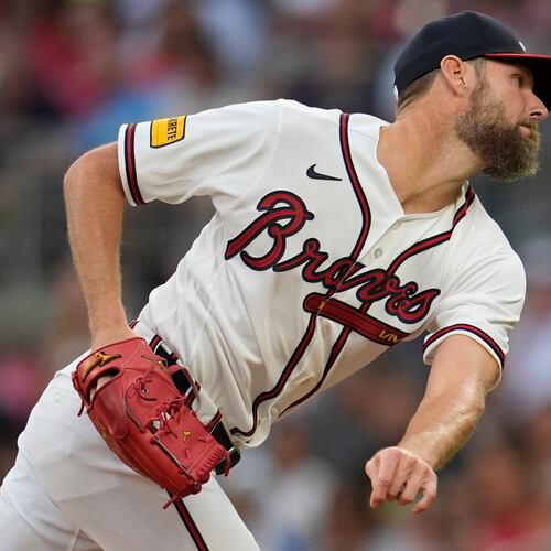 Atlanta Braves pitcher Chris Sale (51) deliveres in the first inning of an opening-day baseball game against the Kansas City Royals, Friday, March 27, 2026, in Atlanta. (AP Photo/Mike Stewart)